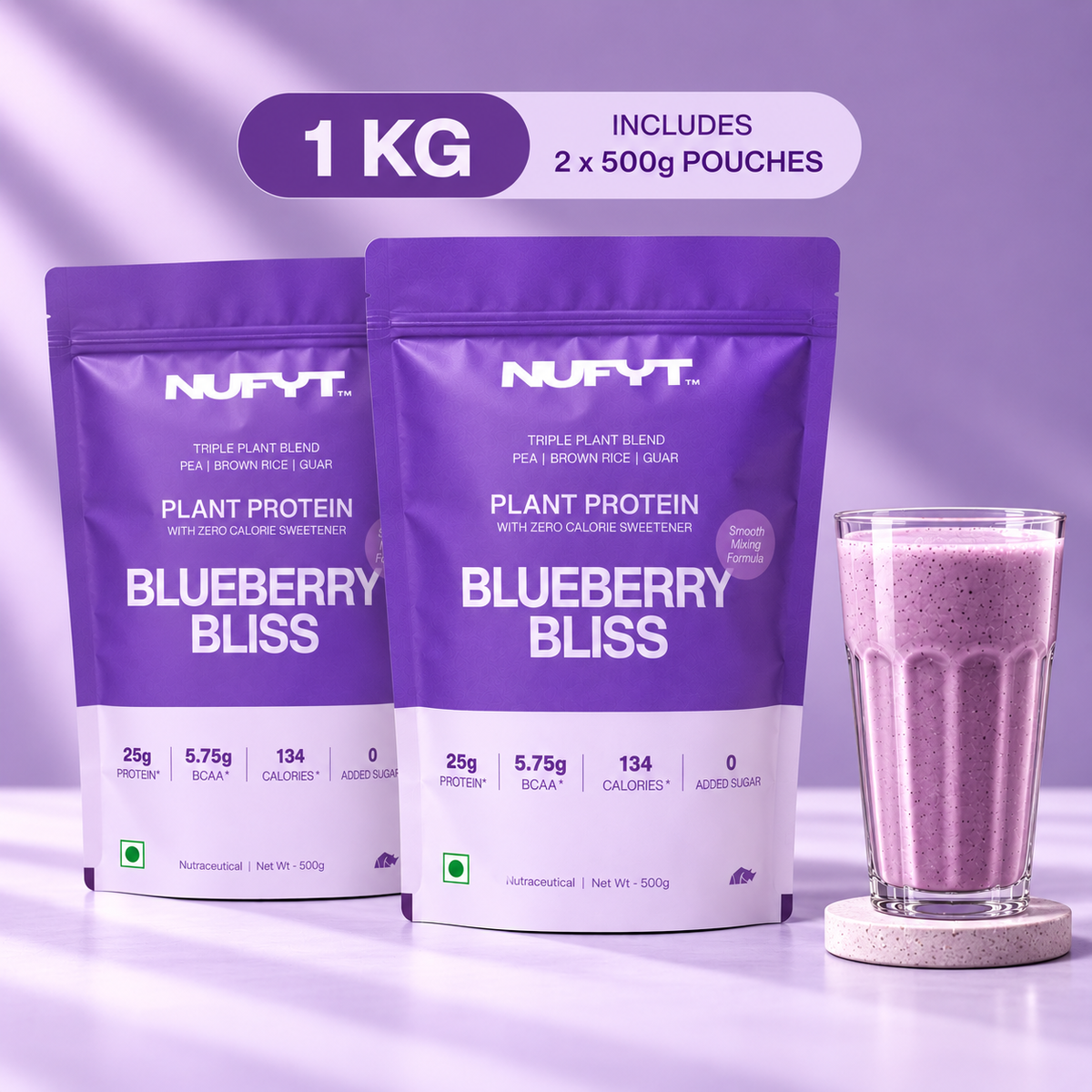 Two purple and white NUFYT Blueberry Bliss plant protein pouches shown on a lavender studio background, with a glass of pinkish-purple smoothie and a purple badge reading '1 KG INCLUDES 2 x 500g POUCHES'.