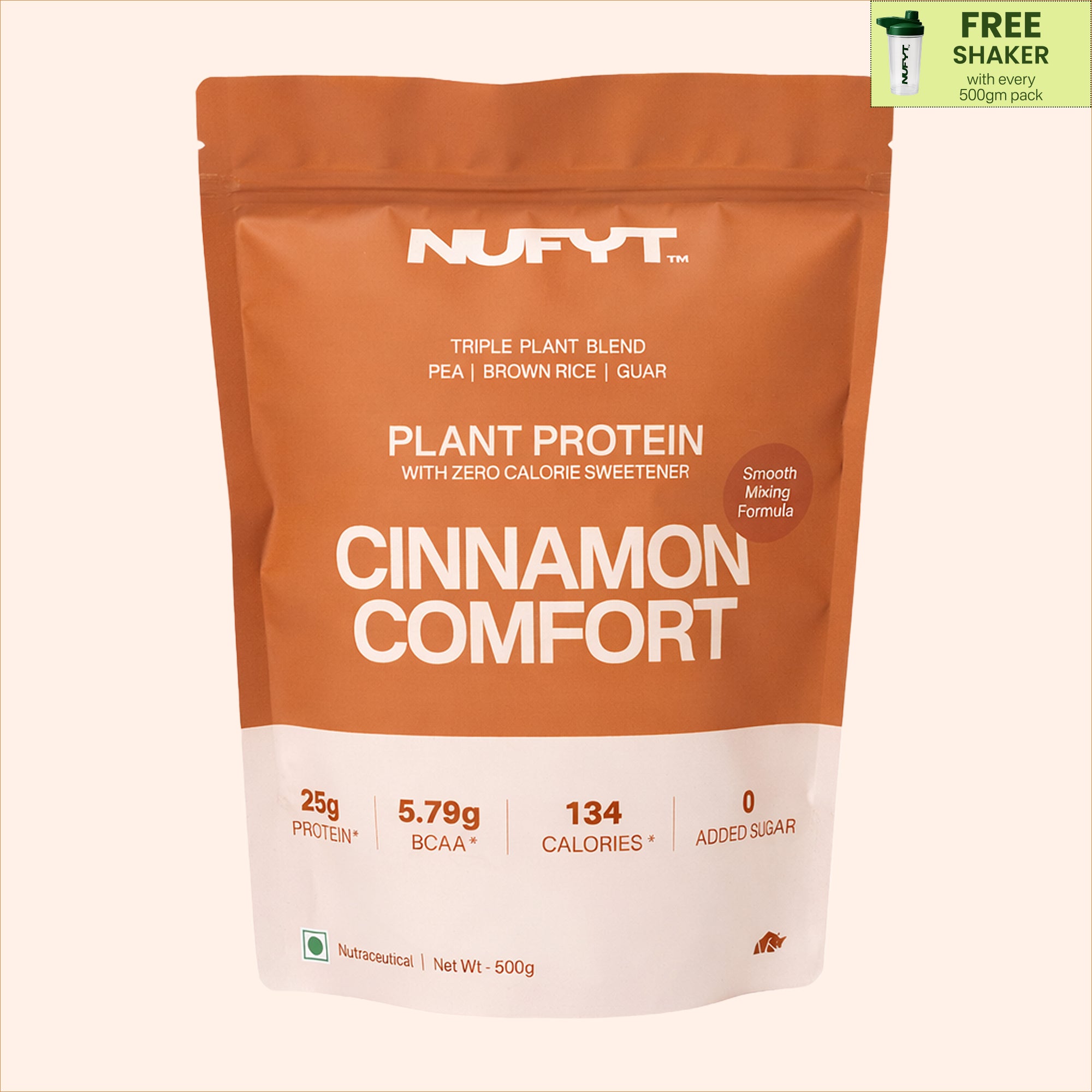 40738732539953 Nufyt Cinnamon Comfort plant protein package with a glass of protein shake, scoop, and cinnamon sticks on a beige background