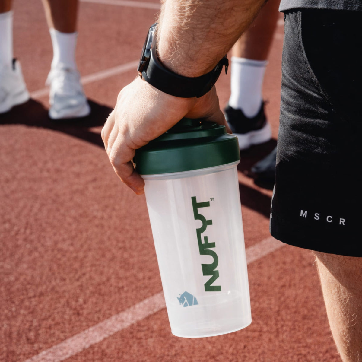 NUFYT BPA-free shaker bottle with durable design, featuring a leak-proof lid and mixing ball for smoothies and protein shakes