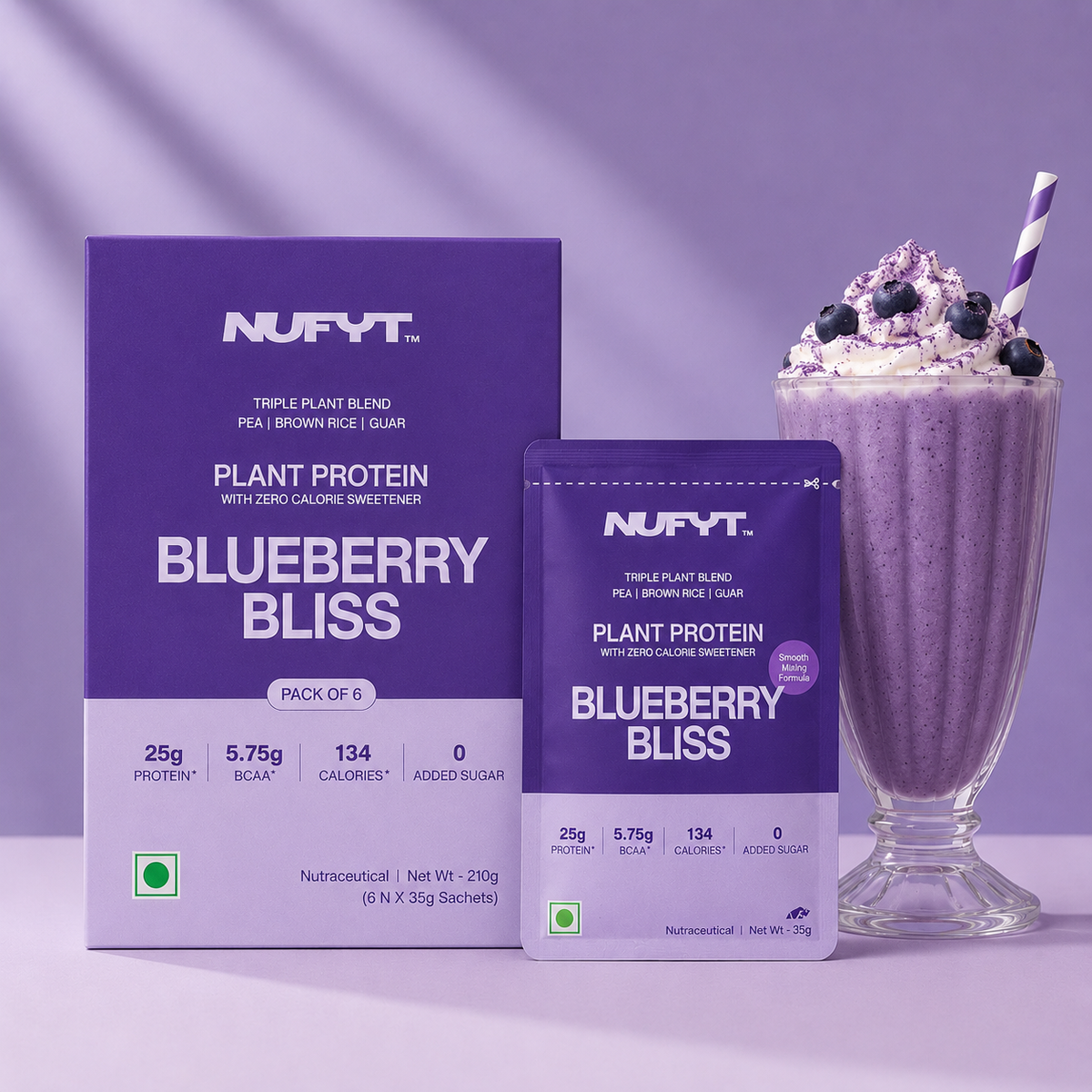 40793201082417 Nufyt Blueberry Bliss plant protein powder packaging shown alongside a purple protein shake in a glass with whipped cream, blueberries, and a striped straw on a lavender background.